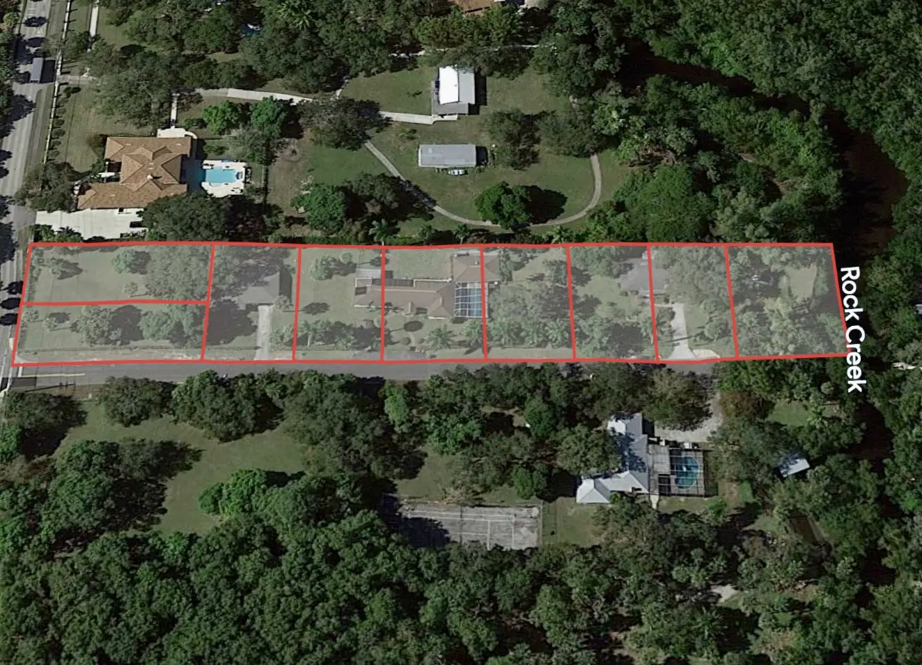 Rectangular property in Naples, FL by TN Capital Investments on Shadowlawn Drive, divided into lots, near Rock Creek, with trees and homes.