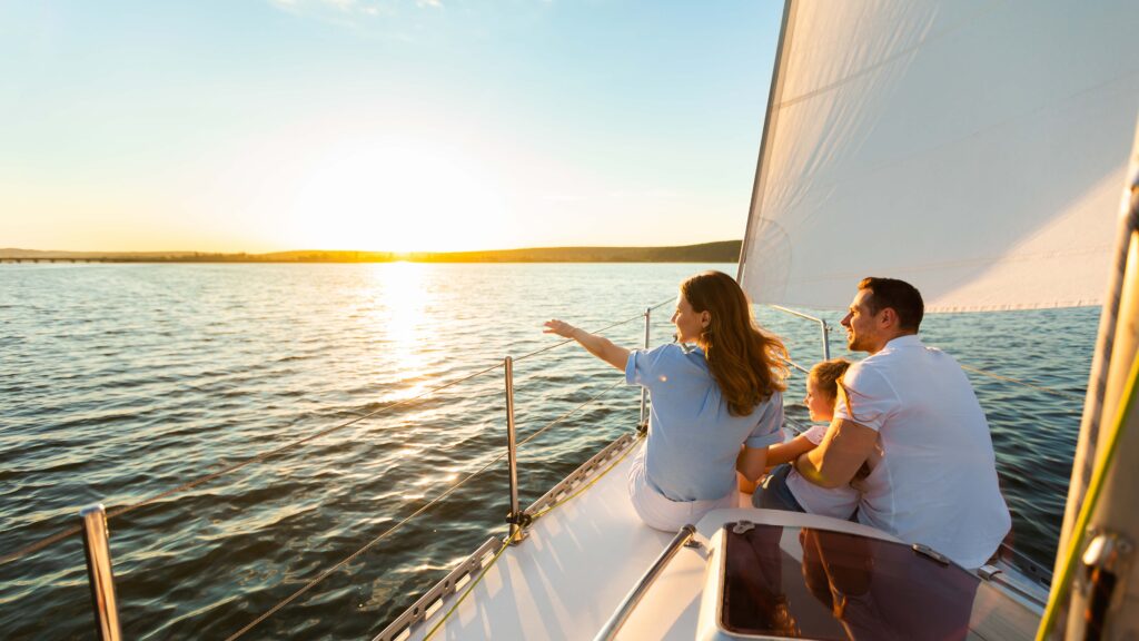 Family of 3 on their yacht